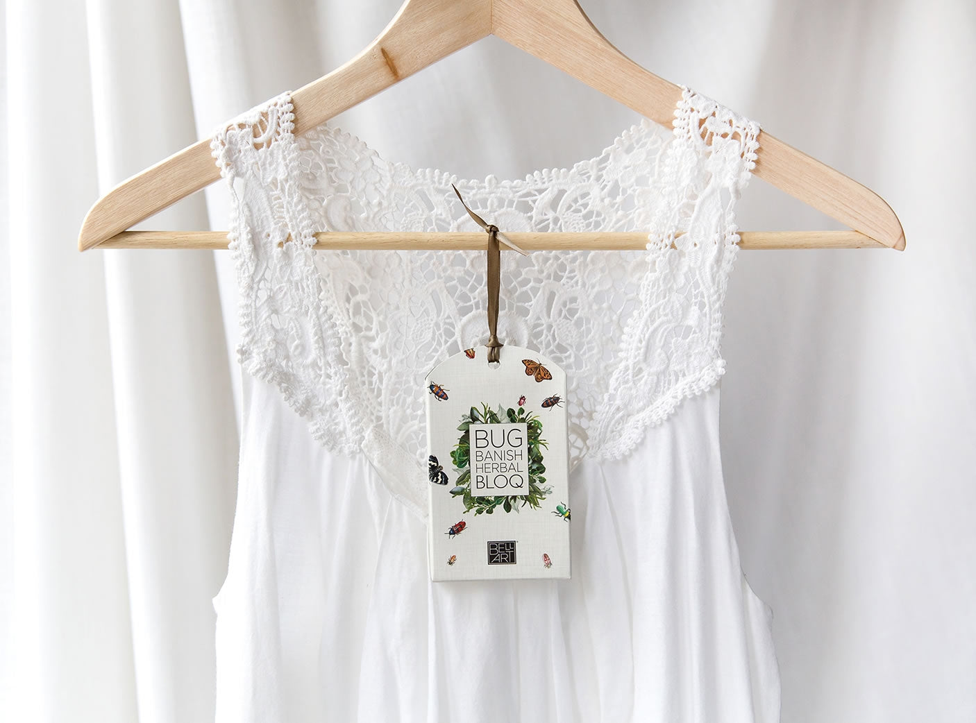 Store Bell Art Bug Banish Bloq on hangers in your wardrobe to banish those bugs!