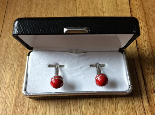 Cricket ball cufflinks in box
